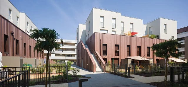 Modern apartment complex with landscaped courtyard
