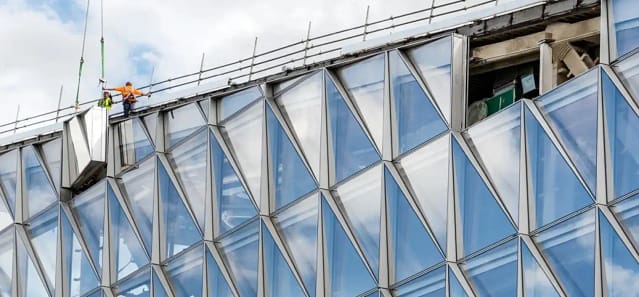 Unitised aluminium section semi for glass façade