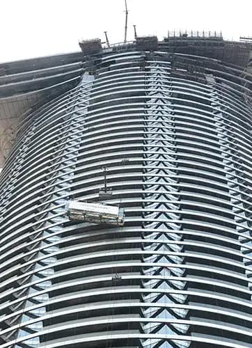 Slide being hoisted into place