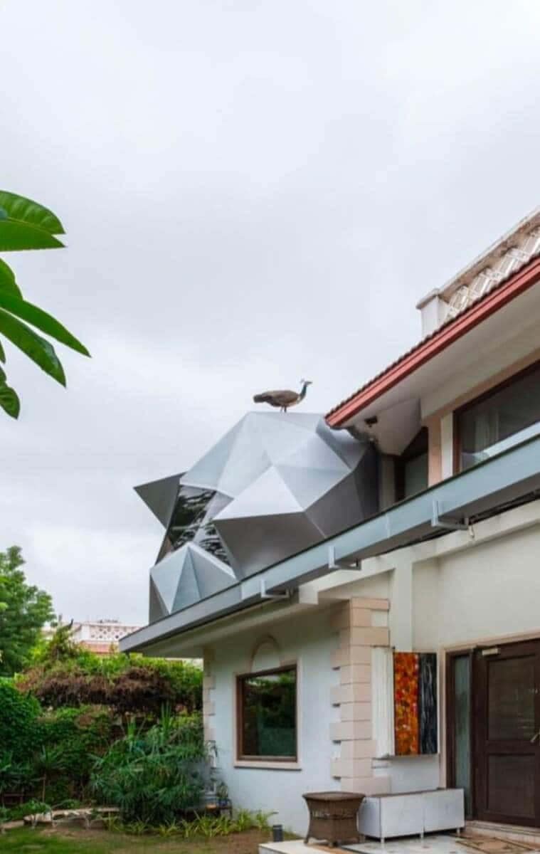 In Symbiotic Parasite, the angular overhang acts as a functional sculpture, blending precise geometry with utility.