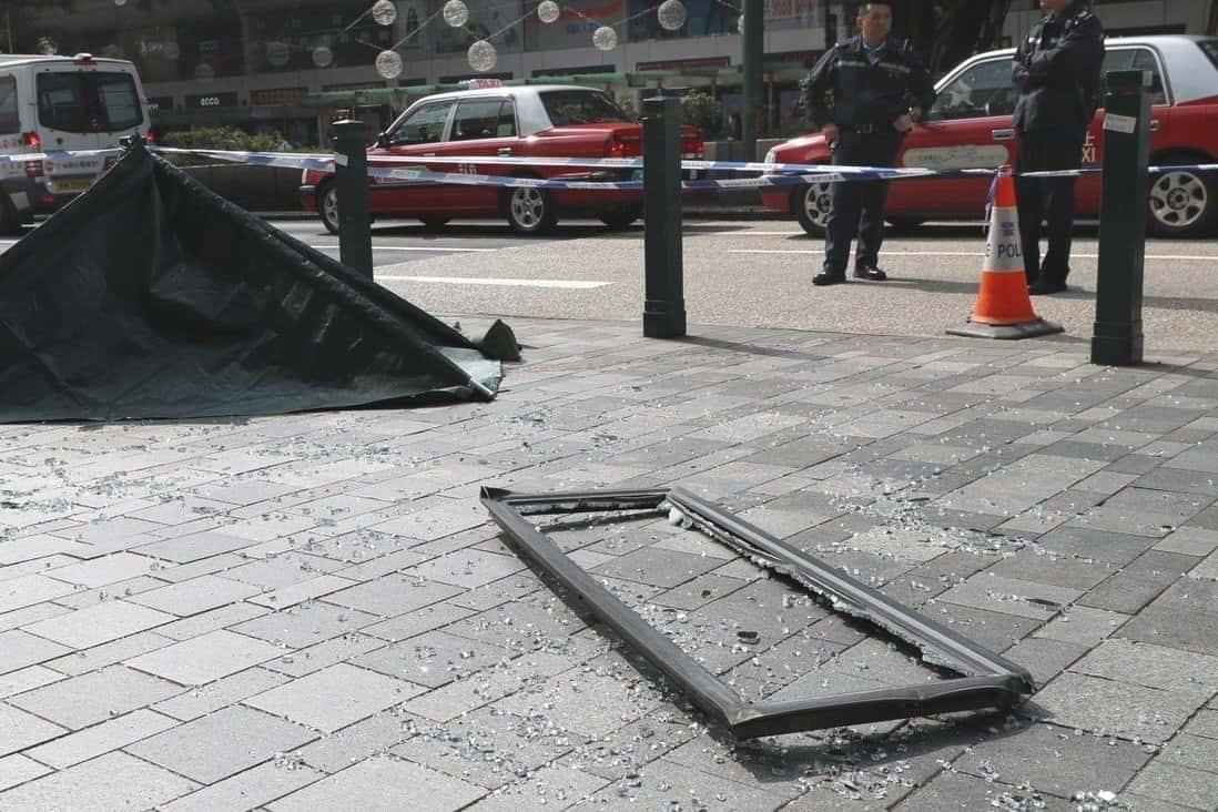 Window glass falls from the top of Manulife Financial Centre in Kwun Tong